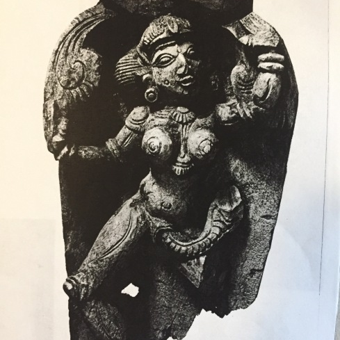 12-inch wooden carving of a naked Yogini with a serpent coming out of her yoni, representing shakti, the life-force energy. South India c. 1800.