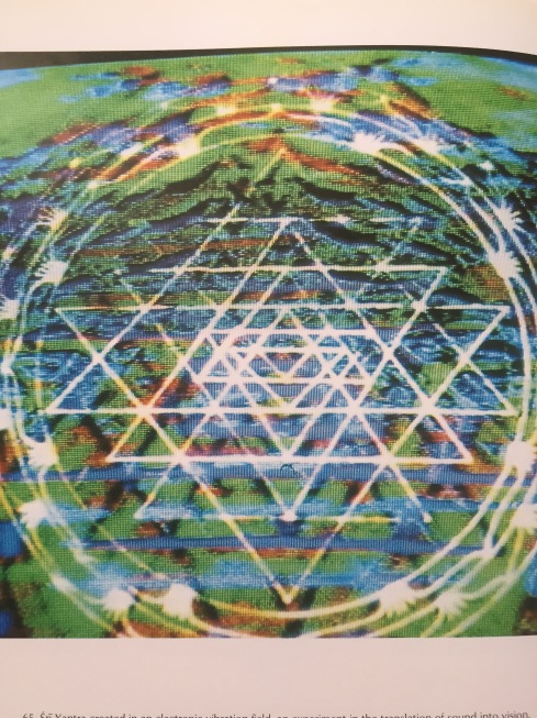 Sri Yantra created in an electronic vibration field, an experiment in the translation of sound into vision. Still from a film by Ronald Nameth